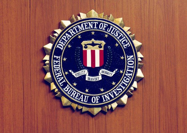 The picture shows the emblem of the Federal Bureau of Investigation (FBI) of the US Justice Department at the US American embassy in Berlin, Germany